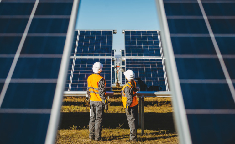 Solar Power Station and Technicians