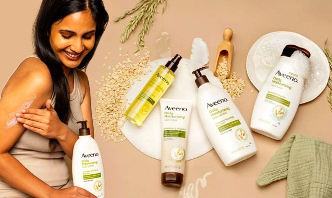 Woman applying aveeno products