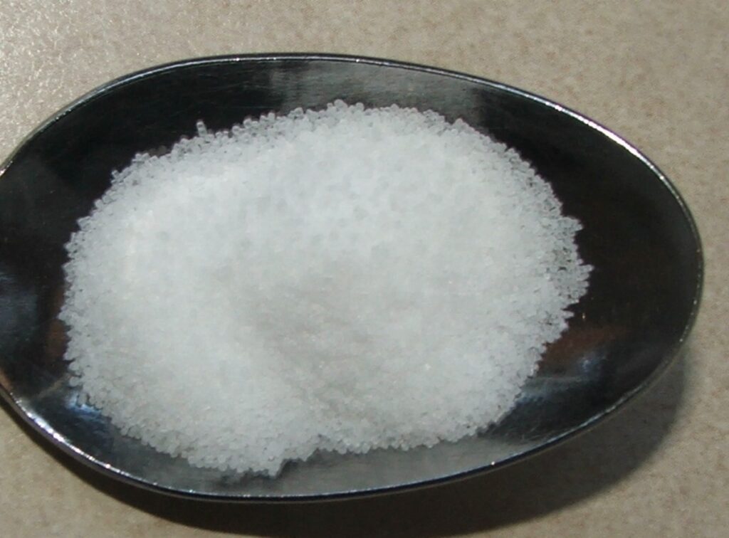 Sodium chloride on a black plate 